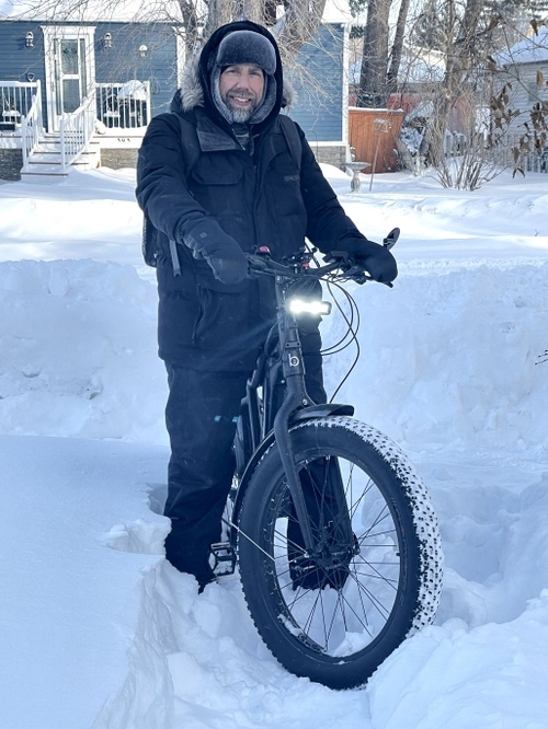 Steve on a bike in the snow
